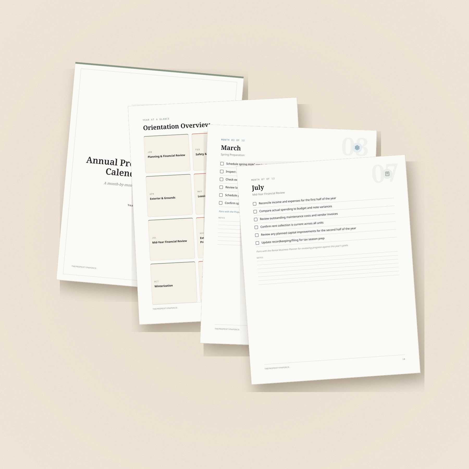 Pages from the Annual Property Management Calendar & Checklist fanned on a warm linen surface