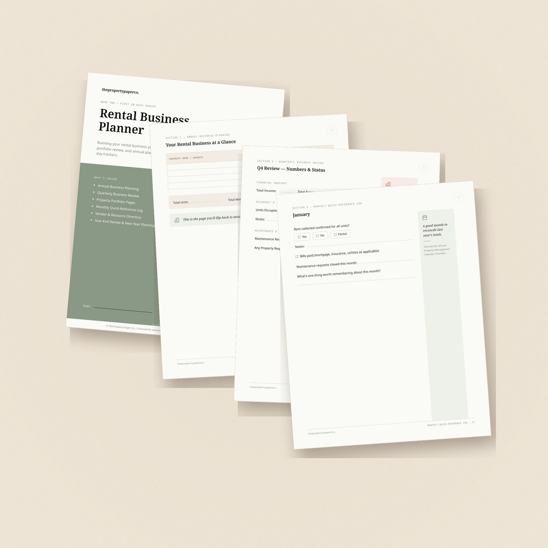 Pages from the Rental Business Planner fanned on a warm linen surface